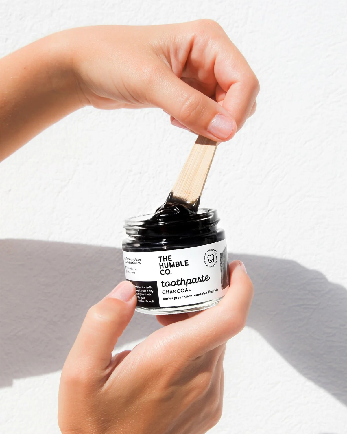 toothpaste-in-glass-jar-charcoal-496779